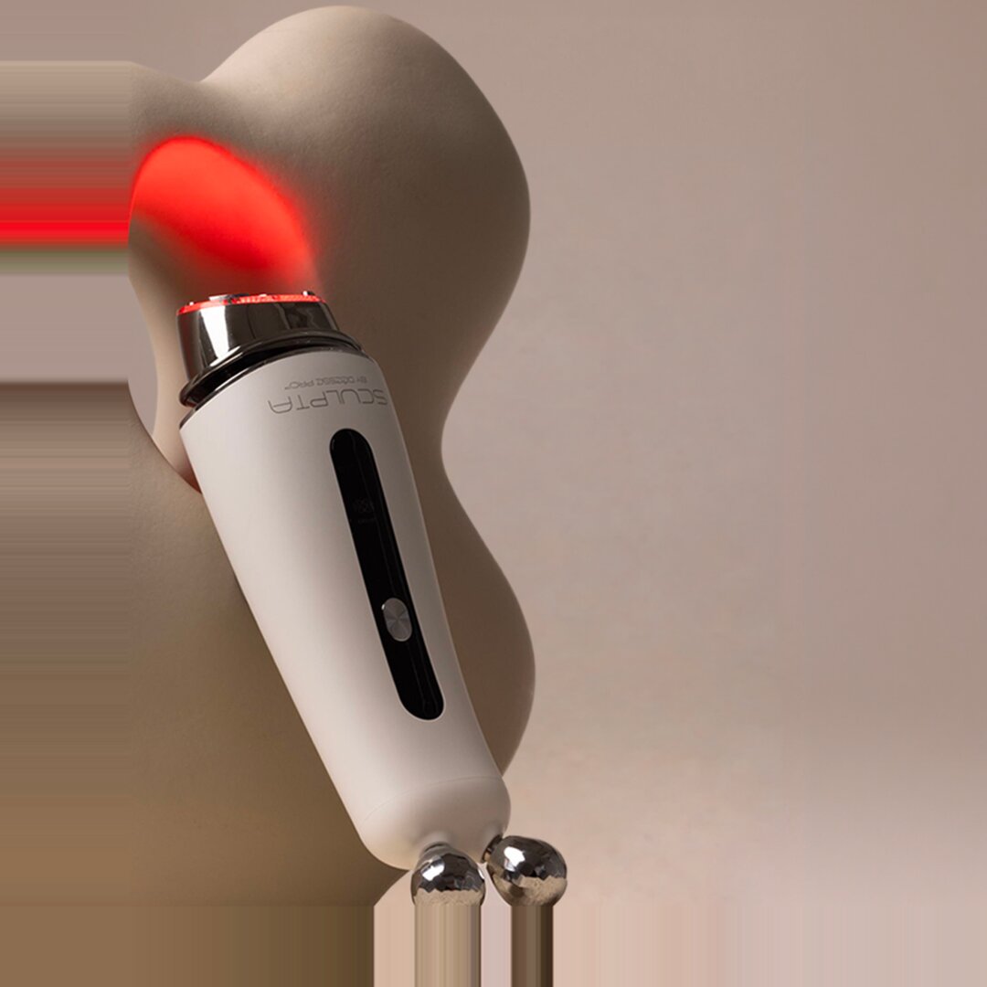 Close-up of the Sculpta treatment head with red LEDs